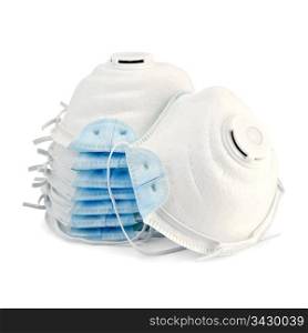 A stack of white with blue detail disposable respirators isolated on white background