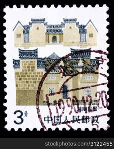 A Stamp printed in China shows local dwelling in Hunan