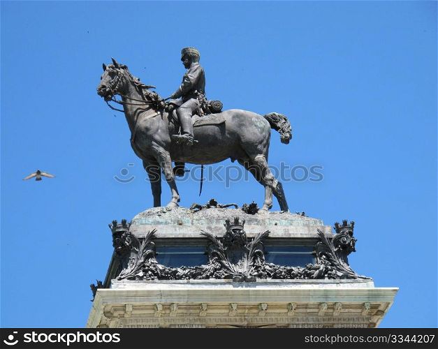 a statue detail of King Alfonso XII Retiro Madrid Spain