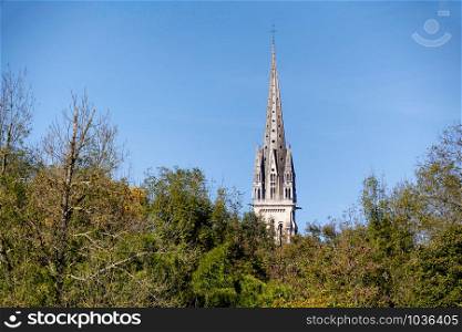 a steeple of a church on a blue sky
