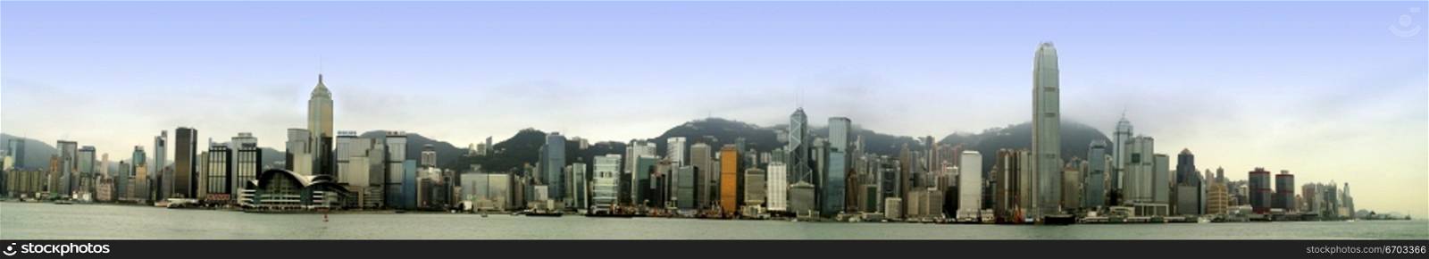 A stock panoramic photo of buildings in Hong Kong, a typical lifestyle in a big crowded city in Asia.