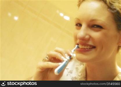 A stock photo of a woman doing beauty treatments