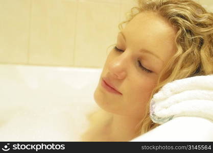 A stock photo of a woman doing beauty treatments