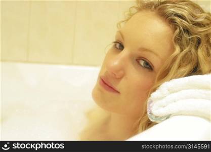 A stock photo of a woman doing beauty treatments