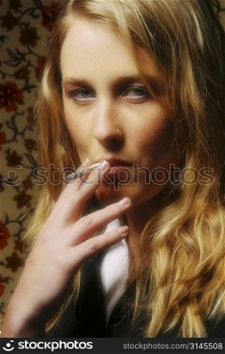 A stock photo of a woman smoking