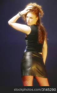 A stock photo of a woman wearing a tight leather skirt