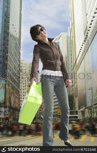 A stock photo of buildings and people in Hong Kong, a typical lifestyle in a big crowded city in Asia. Hong Kong.