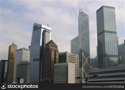 A stock photo of buildings and people in Hong Kong, a typical lifestyle in a big crowded city in Asia. Hong Kong.