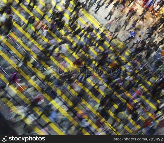 A stock photo of buildings and people in Hong Kong, a typical lifestyle in a big crowded city in Asia. Hing Kong Asia.