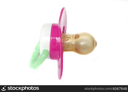 A stock photograph of a babies pacifier.