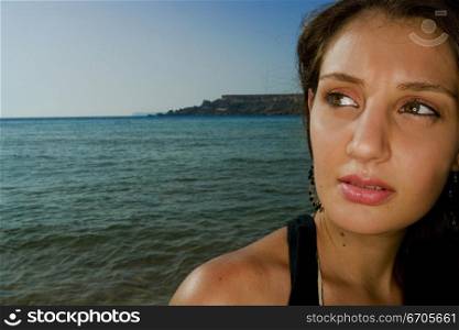 A stock photograph of a portrait of a beautiful young Maltese woman.