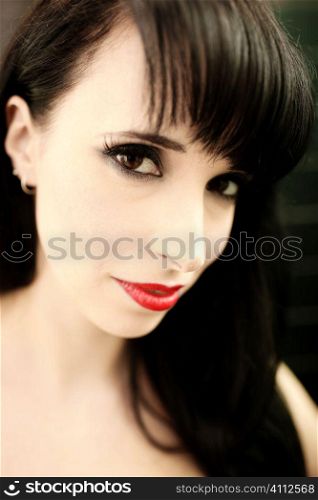 A stock photograph of a stunning looking woman posing in latex fetish clothing