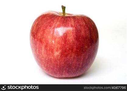 A stock photograph of an apple looking fresh, ripe and healthy.
