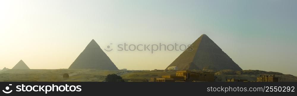 A stock photograph of the Pyramids of Giza in Cairo Egypt.
