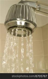 A stock photograph of water being used in a home and the theme of water restrictions currently inplace in a drought.