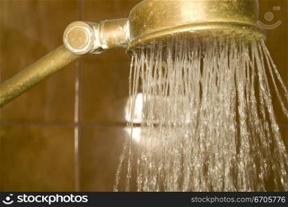 A stock photograph of water being used in a home and the theme of water restrictions currently inplace in a drought.