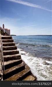 A stone staircase down to the ocean - Rab Croatia