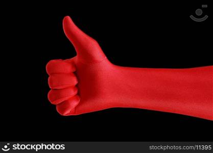 "A strange gloved hand making a "thumb up" gesture"