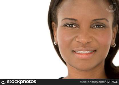 A studio portrait of a beautiful African American woman isolated on a white background