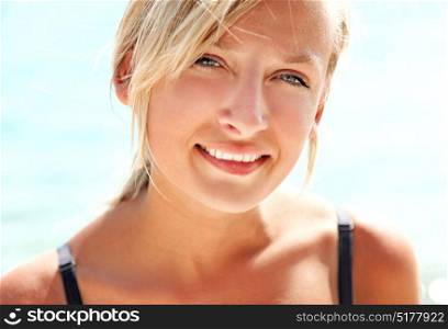 A summer portrait of a young blonde girl