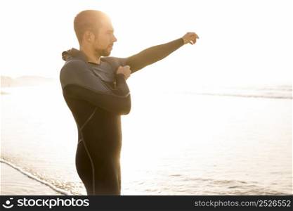 A surfer getting ready for the surf