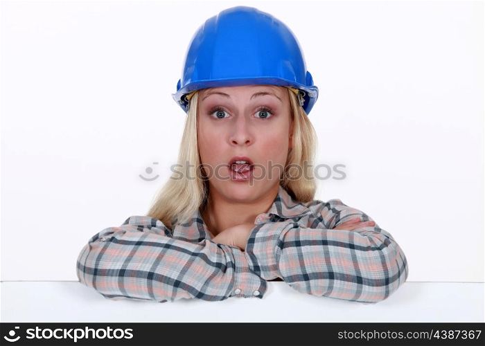 A surprised construction worker