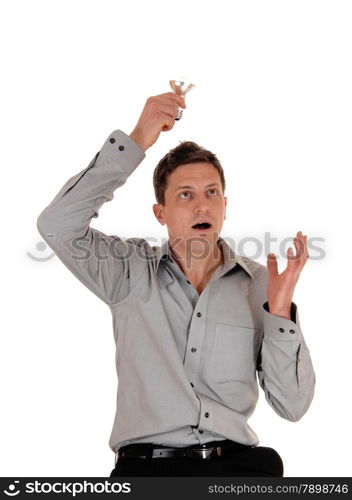 A surprised man holding up a light bulb over his head, wondering the ideahe has is good, isolated for white background.