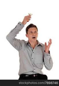 A surprised man holding up a light bulb over his head, wondering the ideahe has is good, isolated for white background.