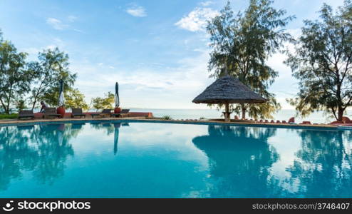 A swimming pool overlooking the Indian Ocean at a beautiful vacation spot