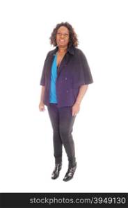A tall African American woman in black tights and jacket standing isolated for white background, whit curly hair.