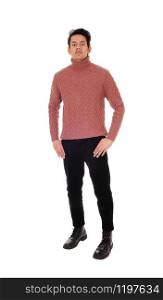 A tall skinny young man in black jeans and a burgundy sweater standing with his thump in his pocked, isolated for white background