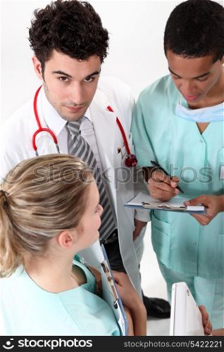 A team of medical professionals conferring