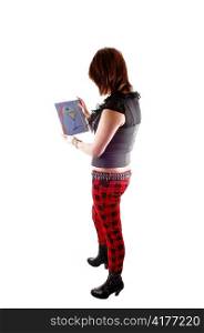 A teenage girl in red chequered pants and boots standing in the studioand show her own painting, for white background.