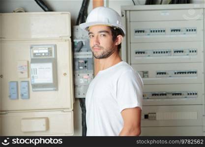 a telecommunication technician is posing