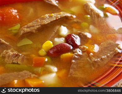 A thick and hearty spicy Mexican soup. (like chili con carne)