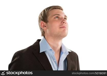 A thoughtful businessman looking up towards copyspace while isolated on white