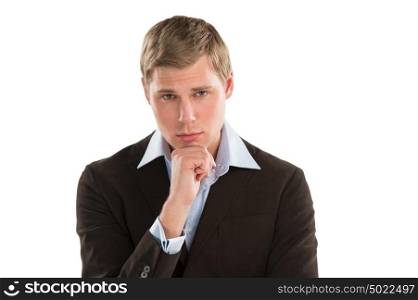 A thoughtful young executive gazing curiously at copyspace while isolated on white