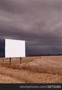 A thuderstorm passes as the billboard advertises nothing