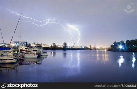A Thunderstorm includes Lightning Strikes in Commencement Bay