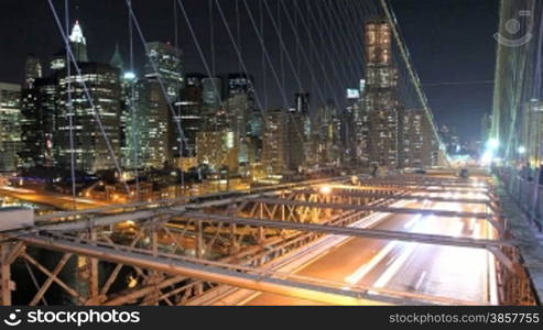 A time lapse of Manhattan, overlooking Brooklyn Bridge at night. Time Lapse.