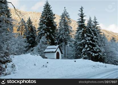 A tiny church beside a mountain road in Austria