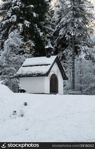 A tiny church beside a mountain road in Austria