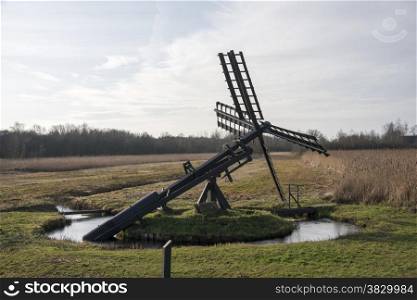 a tjasker watermill in holland to get the water out of the field for the production of peat