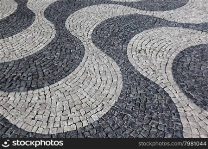 a traditioaal stoneroad in the city centre of Lisbon in Portugal in Europe.. EUROPE PORTUGAL LISBON OLD TOWN STONEROAD