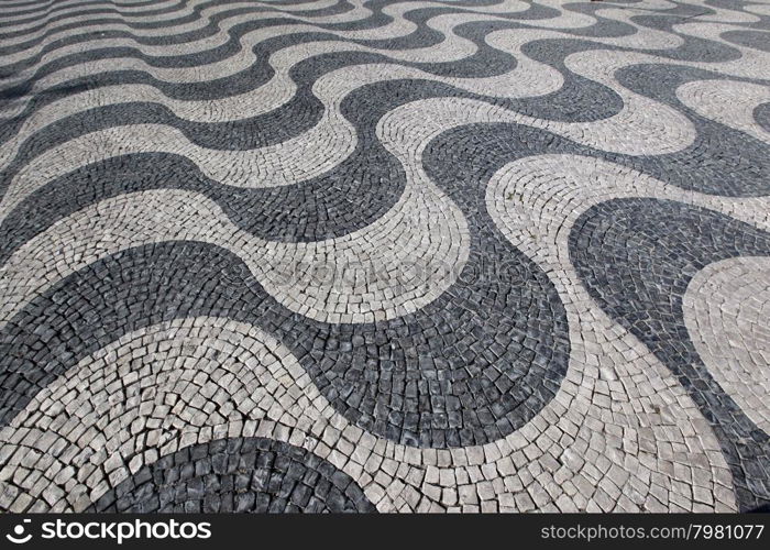 a traditioaal stoneroad in the city centre of Lisbon in Portugal in Europe.. EUROPE PORTUGAL LISBON OLD TOWN STONEROAD