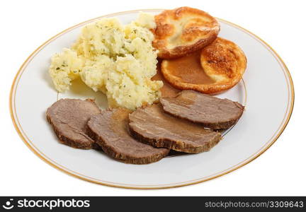 A traditional British meal of roast beef silverside with Yorkshire puddings (popovers) and mashed parsley potatoes.