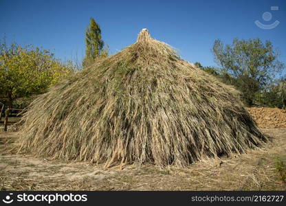 a traditional House of the People at the Ebora Megalithica and Cromlech of Almendres in Almendres near the city of Evora in Alentejo in Portugal. Portugal, Evora, October, 2021