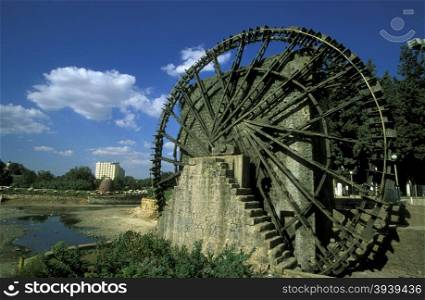 a traditional norias wooden water wheelsl in the city of Hama in Syria in the middle east. MIDDLE EAST SYRIA HAMA WATERWHEELS