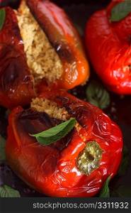 A traditional North African/Middle Eastern vegetarian meal of baked capsicums stuffed with cous-cous (steamed durum wheat semolina granules) mixed with mint and raisins.