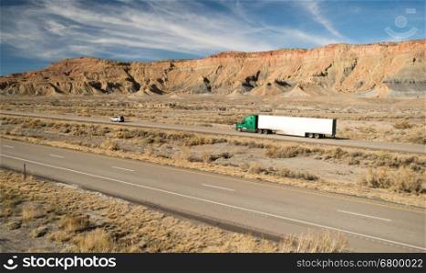 A trucker navigates this Utah highway in his big rig